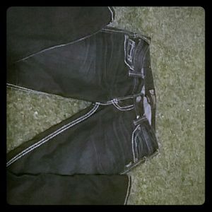 Dark blue with white seaming silver jeans.